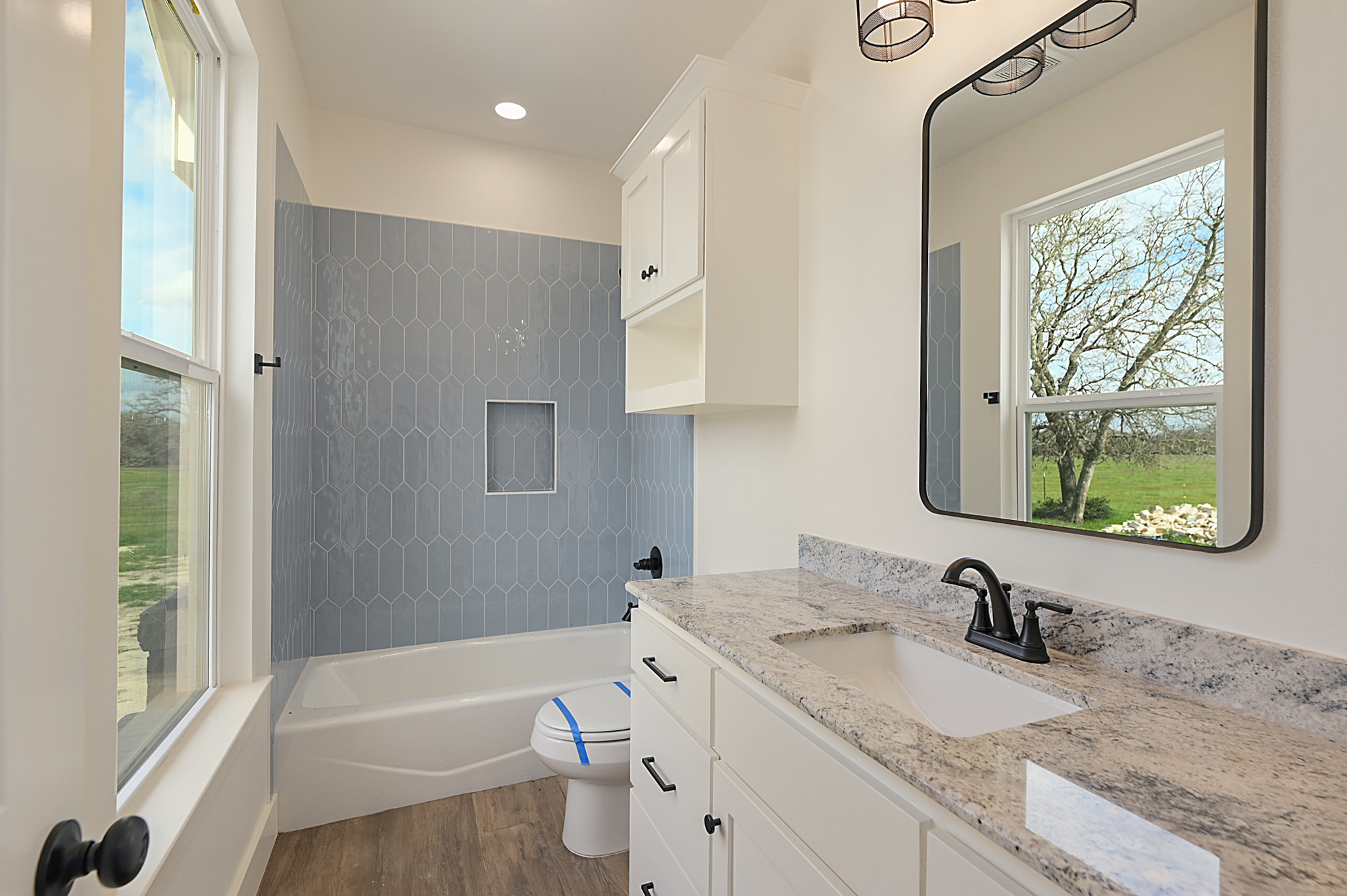 Bathroom with Blue Shower